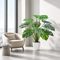 Monstera artificiel en pot avec feuilles blanches pour la décoration intérieure, du bureau et du bureau à domicile