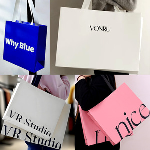 Bolsas de mano blancas personalizadas Rida con impresión de logotipo para empaque de regalos - Product Image 1