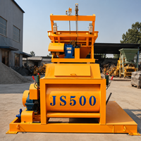 Malaxeur à béton à double arbre JS500 avec grue à câble et porte de déchargement manuelle pour la production de béton préfabriqué