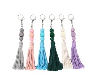 Vente en gros de sac à franges en coton de couleur unie perlé pour femmes porte-clés de voiture pour téléphone portable accessoires porte-clés - Product Image 1