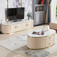 Table basse ovale et meuble TV en cuir blanc de luxe moderne avec plateau en marbre pour le mobilier de salon