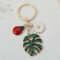 Porte-clés mousqueton mignon bijoux faits main Eanmel avec de belles fleurs d'insectes et de grandes feuilles pour femmes hommes cadeaux d'amitié