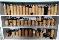 Vente en gros personnalisée de toutes sortes de tasses thermos en acier inoxydable (y compris décoration en bambou + filtre à thé + filtre)