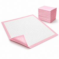Tapis d'apprentissage de la propreté pour chiots roses, avec couche supérieure gaufrée douce, noyau absorbant l'humidité et emballage personnalisé pour la vente au détail