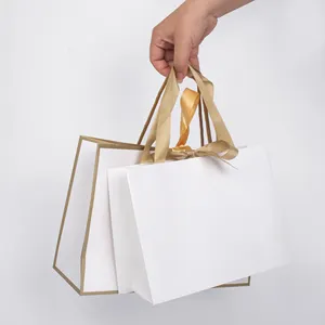 Özel lüks şerit kolu beyaz karton alışveriş ambalaj çanta Wwn logonuzla özelleştirilmiş baskılı kağıt hediye keseleri