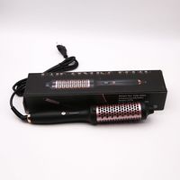 Brosse à air chaud professionnelle 2-en-1 : Sèche-cheveux volumateur et styler ionique avec écran LED et boucleur rotatif