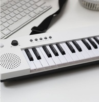 Kids Electric Piano Keyboard 37 Keys Keytar, Musical Instrument, Portable Electronic Pianos Toy for Girls Child Beginners