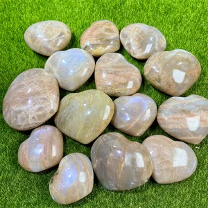 Commercio all'ingrosso cristalli pietre Fengshui di alta qualità arancione luna pietra di cristallo cuore per il regalo