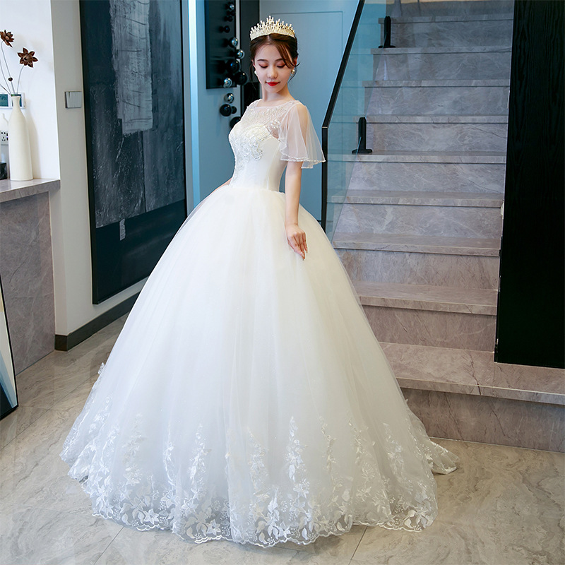 Plus Size A-Line Wedding Dress with O-Neck Design and Beaded Appliques for Floor-Length Elegance in White Polyester Fabric