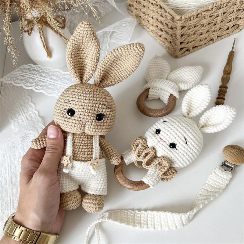 One set(Doll/rattle/pacifier chain)