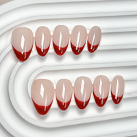 Ongles à presser courts en amande faits à la main, rouge classique, French manucure élégante, usage quotidien, luxe artisanal avec colle, ongles en gel pour doigts