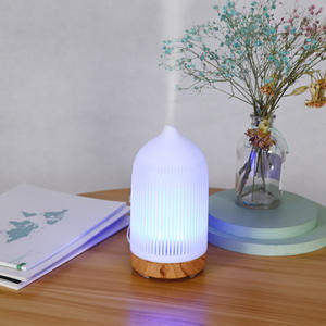 Diffuseur d'arômes sept couleurs, humidificateur ultrasonique mini de bureau, grain de bois, lumière LED, utilisation à domicile et en chambre, capacité de 0,5 L - Product Image 4