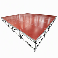 Plateforme de scène modulaire en aluminium noir pour événements, concerts, expositions et salons professionnels