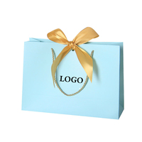Sacs en papier cadeau de luxe blancs personnalisés avec logo privé imprimé, avec nœud en ruban pour chaussures
