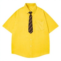 Chemise à manches courtes de style américain vintage avec lettres brodées et petits accents floraux ; Coupe ample décontractée pour couples, unisexe, été