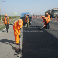 Mélange d'asphalte froid modifié de qualité supérieure Roadphalt et sac pour réparation routière