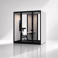 Espace de lecture intérieur, isolation acoustique, cabine de bureau insonorisée, salle de conférence insonorisée, cabine insonorisée avec table et canapé