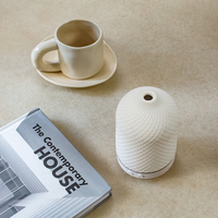Diffuseur d'huiles essentielles et humidificateur d'air électrique ultrasonique de table 100 ml en céramique écologique pour hôtels, en promotion, garantie 1 an