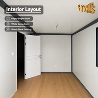 HEYING Maison conteneur pliable moderne de 20 pieds avec revêtement imitation bois, 2 chambres, pour glamping, hébergement, grande terrasse avant, hôtel