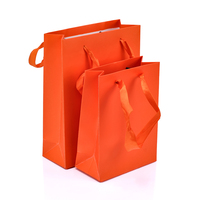 Sacs cadeaux en papier kraft à poignée, prix d'usine, pour emballage de desserts, sacs de shopping, sacs de marchandises pour les entreprises, boutiques, faveurs de fête