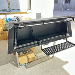 หลังคาแข็งแบบกันน้ำ <span class=keywords><strong>Sbt</strong></span> Overlanding ทำจากอลูมิเนียมอัลลอยด์ พร้อมระบบติดตั้งแบบไม่ต้องเจาะ และกล่องเก็บของท้ายแบบล็อคได้ สำหรับรถกระบะโตโยต้าขนาด 5 ฟุต - Product Image 1