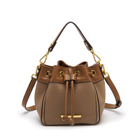 Bolso de cubo pequeño de cuero con cordón y empalmes, para mujer, nueva moda, estilo popular en redes, con un toque de sofisticación y exclusividad, tipo bandolera