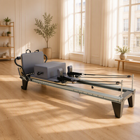 Machine de Pilates Reformer en aluminium noir haut de gamme pour musculation et yoga, avec lit coulissant complet et planche de saut, durable et portable