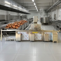 Marmite de cuisson à vapeur à volume personnalisé avec système de levage automatique du panier pour l'usine de snacks à base de viande