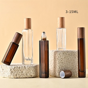 Luxury <strong>Walnut</strong> Cover Amber square Glass Roll on Bottle clear Round 3ml 5ml 10ml 15ml Empty <strong>Essential</strong> <strong>Oil</strong> Glass Roll on Bottle - Product Image 1