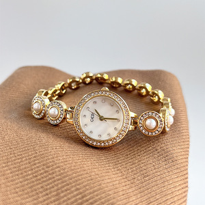 Montre-bracelet vintage élégante, montre de luxe haut de gamme pour femme avec cadran perlé, montre à quartz au toucher haut de gamme - Product Image 1