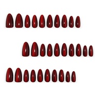 Nouvel arrivage : Kit de 30 faux ongles à porter, effet œil-de-chat bordeaux profond et amande cerise, très tendance