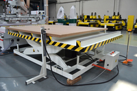 Machine CNC de routeurs en bois avec système de chargement et de déchargement automatiques pour la production massive de meubles en panneaux