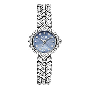 Montre en alliage pour femme Goldie Fashion, cadran en nacre, bracelet en queue de poisson, aiguille lumineuse, montre à quartz haut de gamme de luxe - Product Image 1