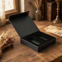 Boîte noire de luxe en forme de livre avec logo personnalisé, emballage en mousse EVA pour parfum, fermeture magnétique, boîte carrée avec insert en mousse