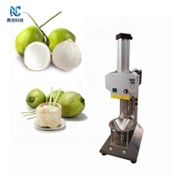 Machine industrielle de décorticage et d'épluchage rapide des noix de coco vertes/machine automatique de décorticage des noix de coco