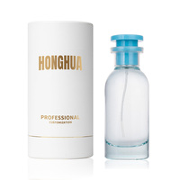 Vente en gros de flacons de parfum en verre rose de 80 ml avec mécanisme de pulvérisation anti-fuite et boîte cadeau personnalisée