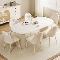 Ensemble table et chaises de salle à manger de style crème luxueux, ovale, moderne, simple, blanc pur, assemblé, table à plateau, chaise combinée, rock