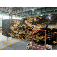 Dalles de granit naturel noir véritable avec matrice dorée en titane, granit Magma Gold pour plan de travail