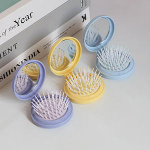 Peine con espejo portátil con cerdas de nailon, cepillo para el cabello de viaje de color azul claro para adultos, diseño bonito, estilo compacto - Product Image 1