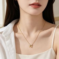Collier élégant et délicat avec nœud papillon doré, zircon brillant de haute qualité, accessoires de bijoux de mode pour femmes, vente en gros TGXL14679