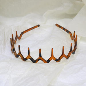 Vente en gros de peignes à cheveux bandeaux en plastique noir unisexe bandeaux à dents antidérapants pour femmes hommes filles - Product Image 2