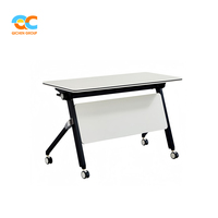 Table de conférence modulable blanche avec cadre noir, panneau de modestie blanc et roulettes, pliable pour salles de formation et bureaux