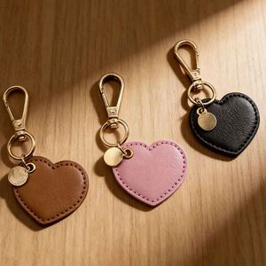 Wholesale Pu Leather Luxury Women Pendant Elegant Pretty Promotional Shaped Heart Keychain <b>Bag</b> <b>Charms</b> - Product Image 2