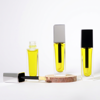 Flacon de brillant à lèvres en verre carré de 10 ml à fond épais, transparent givré, avec bouchon applicateur, emballage cosmétique personnalisé avec logo