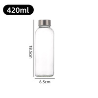 Bocaux de conservation cylindriques en verre lisse avec couvercles hermétiques en acier, idéaux pour les boissons maison à base de plantes, d'eau et de fruits, et pour le rangement en cuisine.