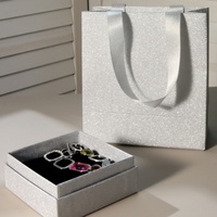 Boîte à bijoux rigide en kraft écologique avec paillettes argentées, ruban en satin, sac cadeau, emballage haut de gamme pour bijoux et montres, fabriqué par Baoren Factory