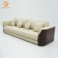 Sofa Luxus Beige Leders ofa mit runden und quadratischen Kissen Hochwertige moderne Wohnzimmer möbel für elegante Wohnkultur