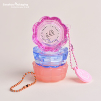 Mini pot de soin des lèvres de 1.5 ml avec porte-clés conteneur de gommage des lèvres en forme de fleur pour le voyage