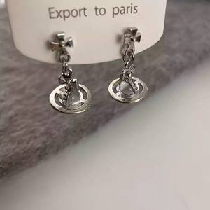 Élégantes boucles d'oreilles pendantes Saturne en perles de verre 3D, clous d'oreilles planètes diamantées pour femmes et jeunes filles - Product Image 5