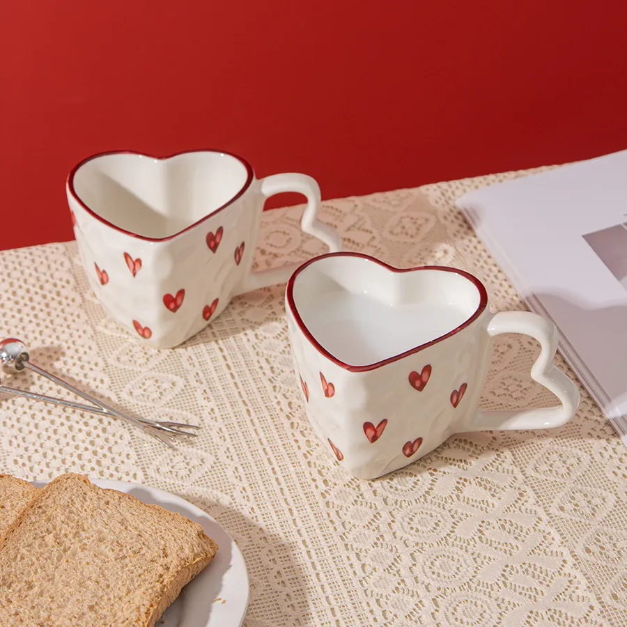 Tazza di latte in ceramica carina tazza di caffè con manico a cuore creativo con design Pattern personalizzata dipinta a mano